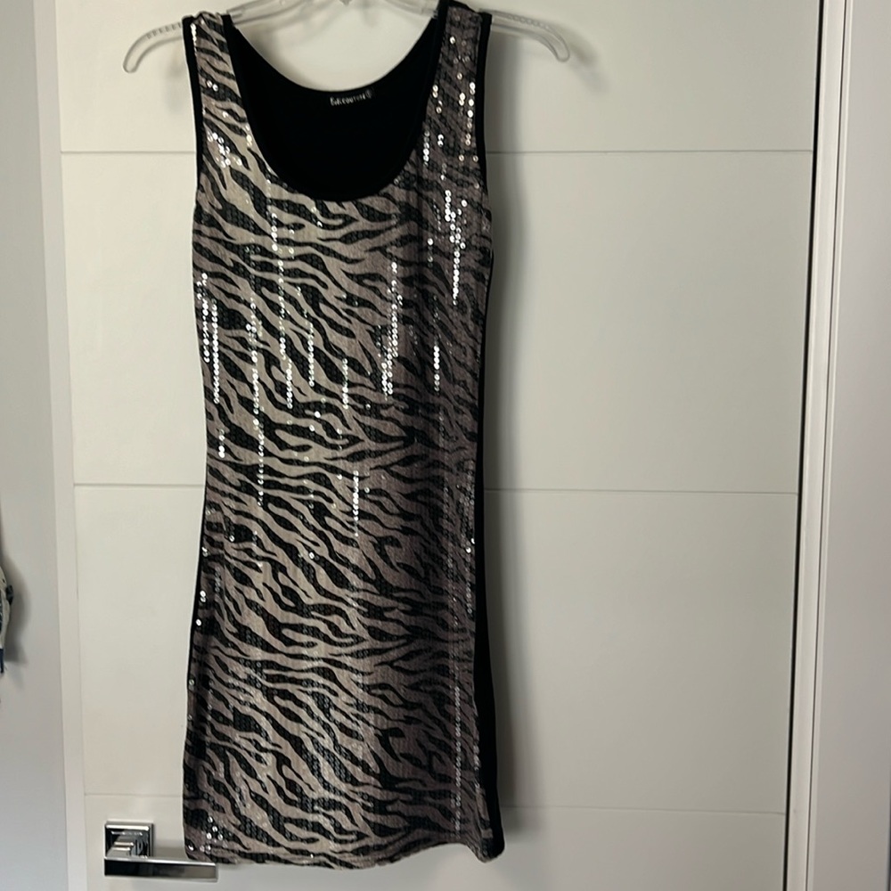 Race back animal print sequins dress.